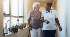Personal support worker with a senior resident