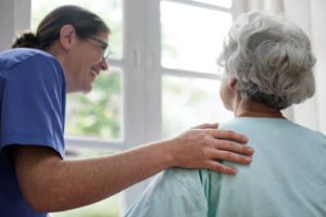 Nurse taking care of a senior woman