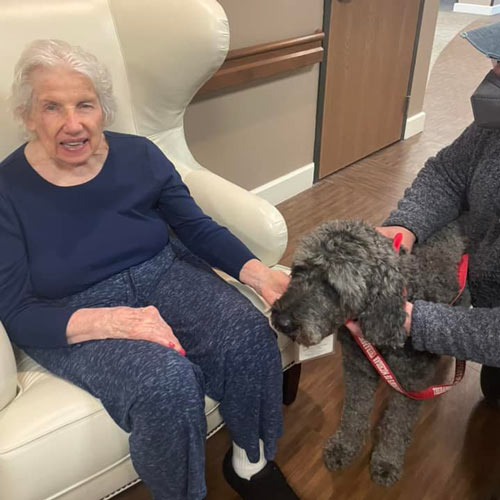 Gatnon's resident with visiting service dog