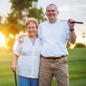 active adults enjoying golf